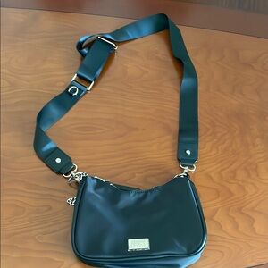 Black Crossbody Bag with Adjustable Strap and Silver Hardware